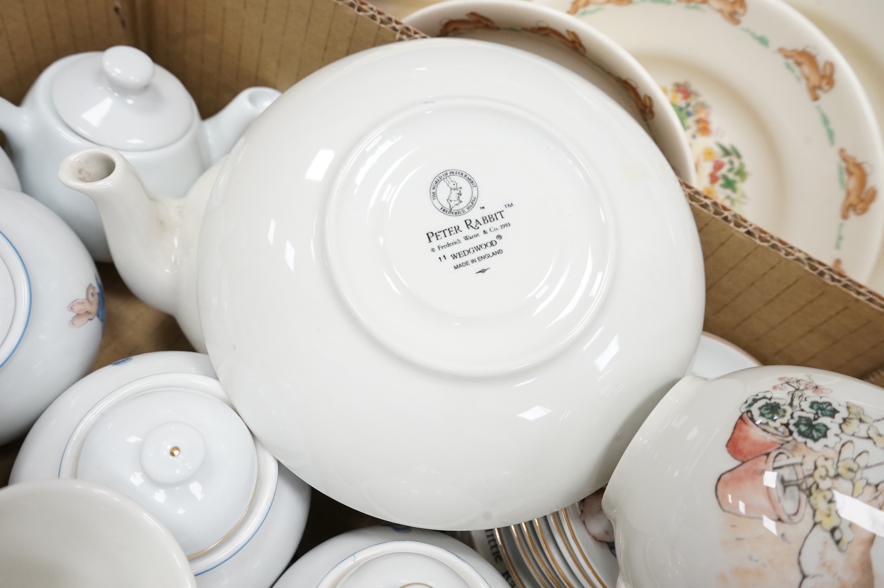 A collection of ‘Bunnykins’ dolls teaware and similar child’s breakfast ware, bowls 15cm diameter